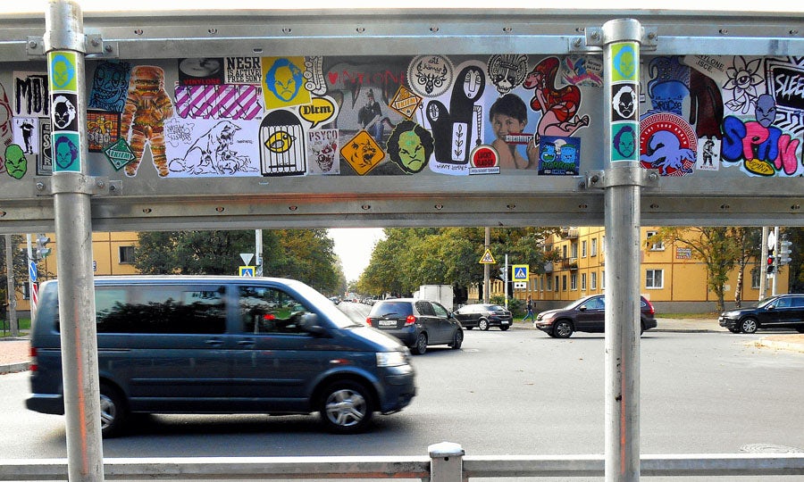 Sticker art on a street sign