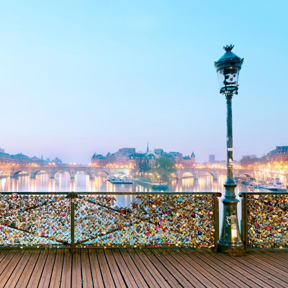 Photo of padlock bridge over the Seine River in Paris