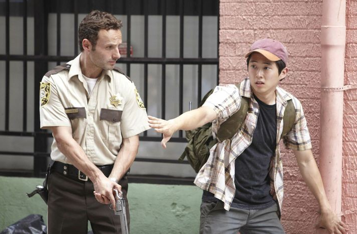 Andrew Lincoln as Rick Grimes and Steven Yeun as Glenn