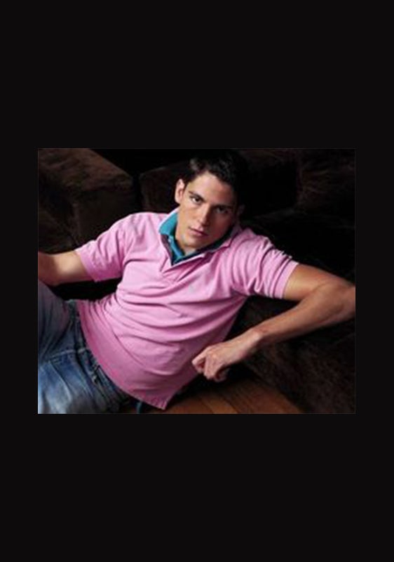 man in two pastel polos with popped collars