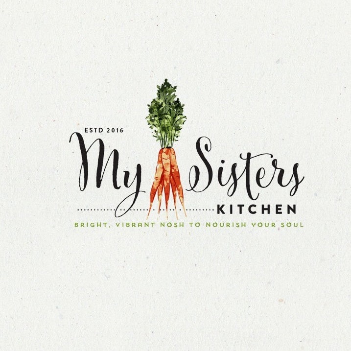 a stalk of vibrant carrots with the words “My Sisters Kitchen”