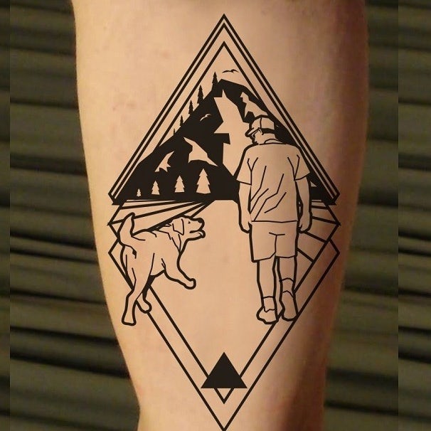 Man and dog tattoo