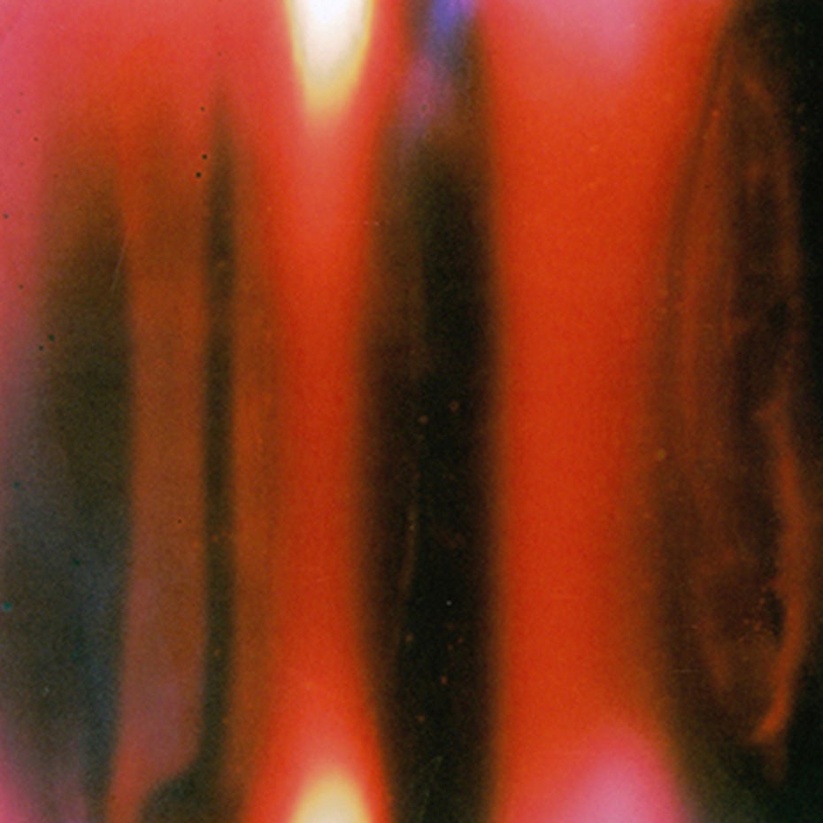 A glitch art design featuring a light leak