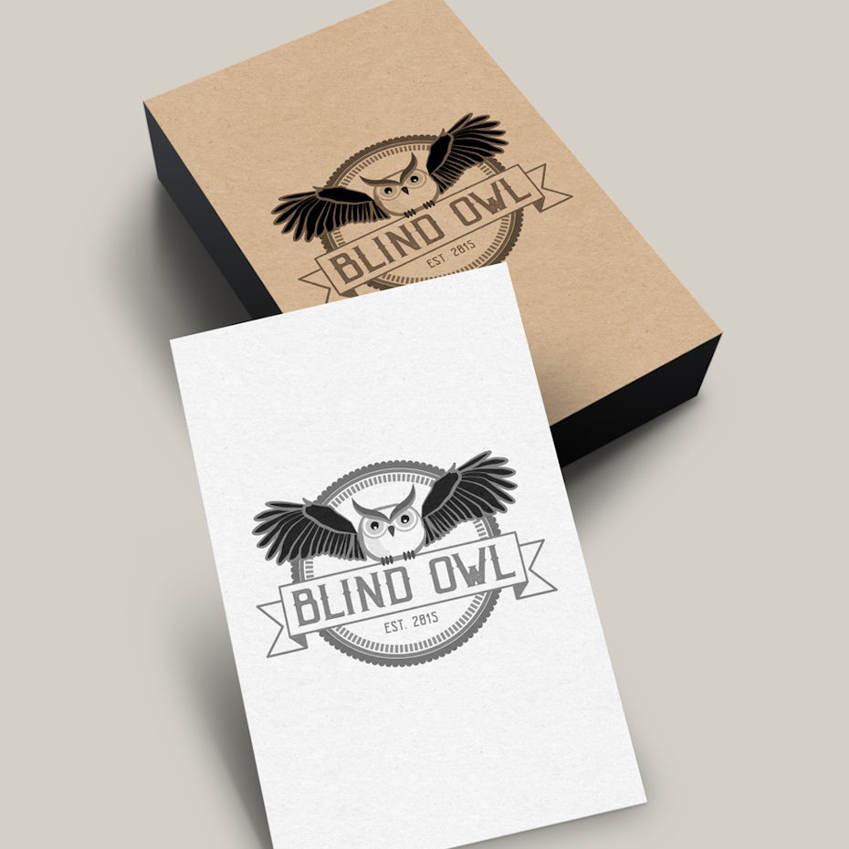 round logo showing an image of an owl with outstretched wings