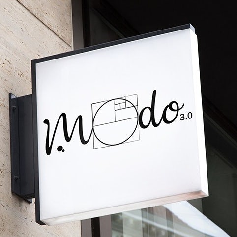 Logo design trends example: Black and white wordmark logo with a reference to the golden ratio in the O