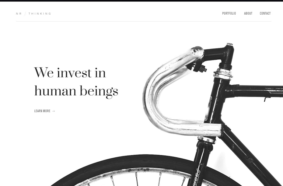 minimalist monochrome web design with large photo of bicycle