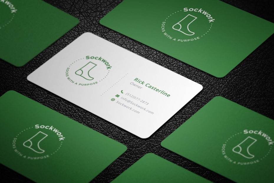 Green and white business cards with images of socks on them