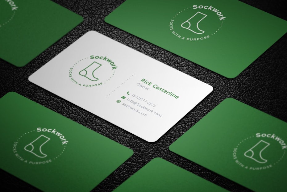 Green and white business cards with images of socks on them