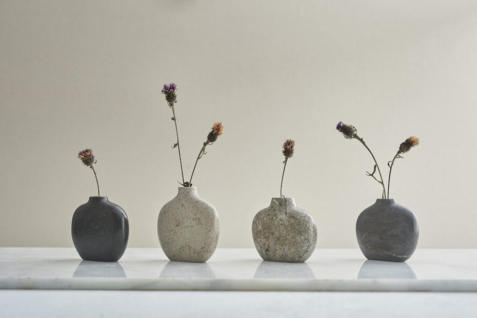 Photo of ceramic vases with flowers