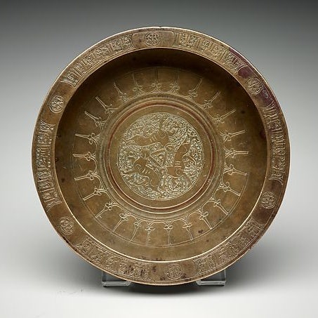 Copper tray showing the three hares symbol