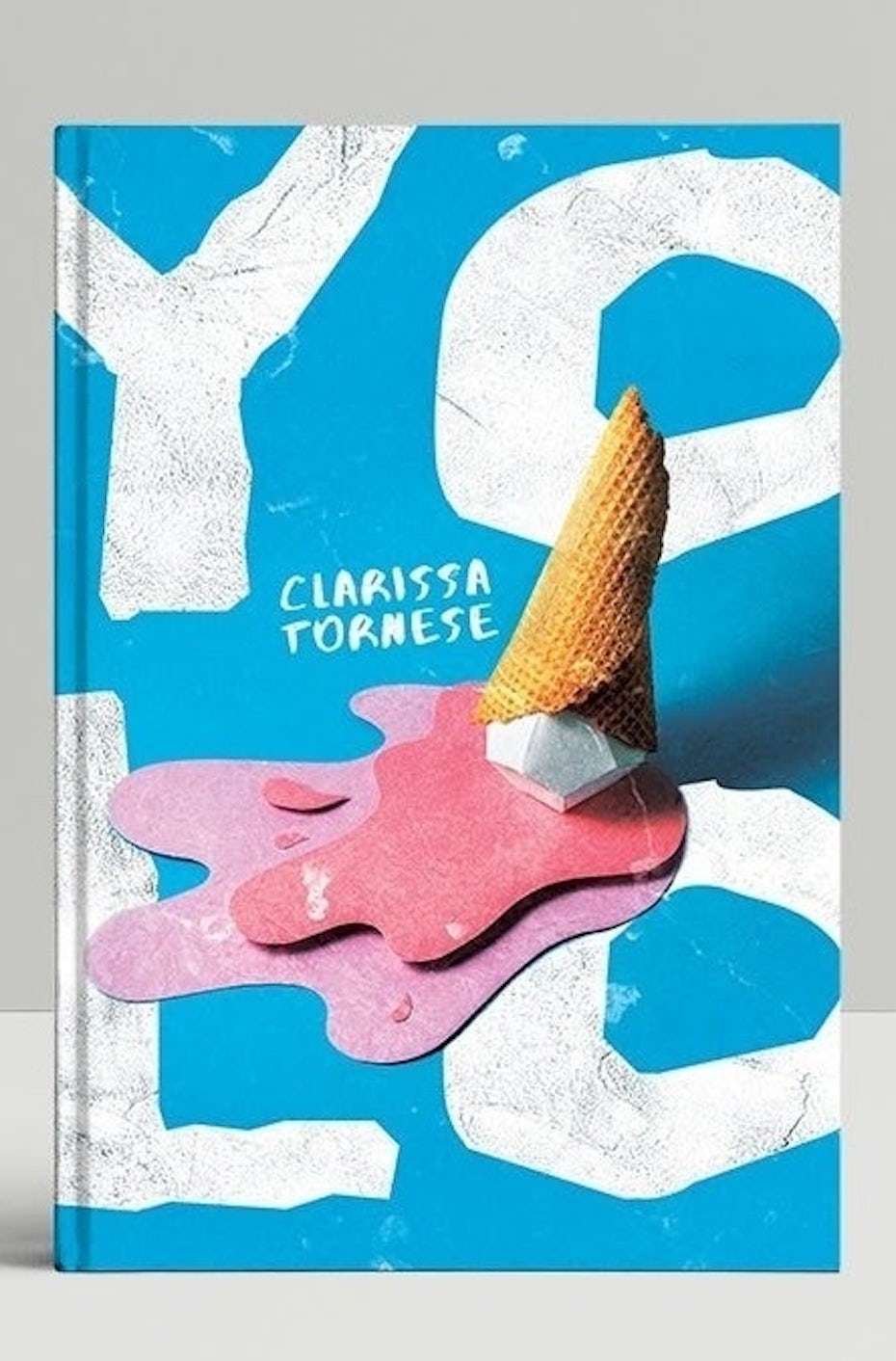 Collage book design showing pink ice cream on the ground against white letters and a blue background