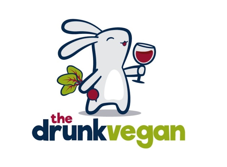 Logo design with bunny holding wine class and beet for the drunk vegan 