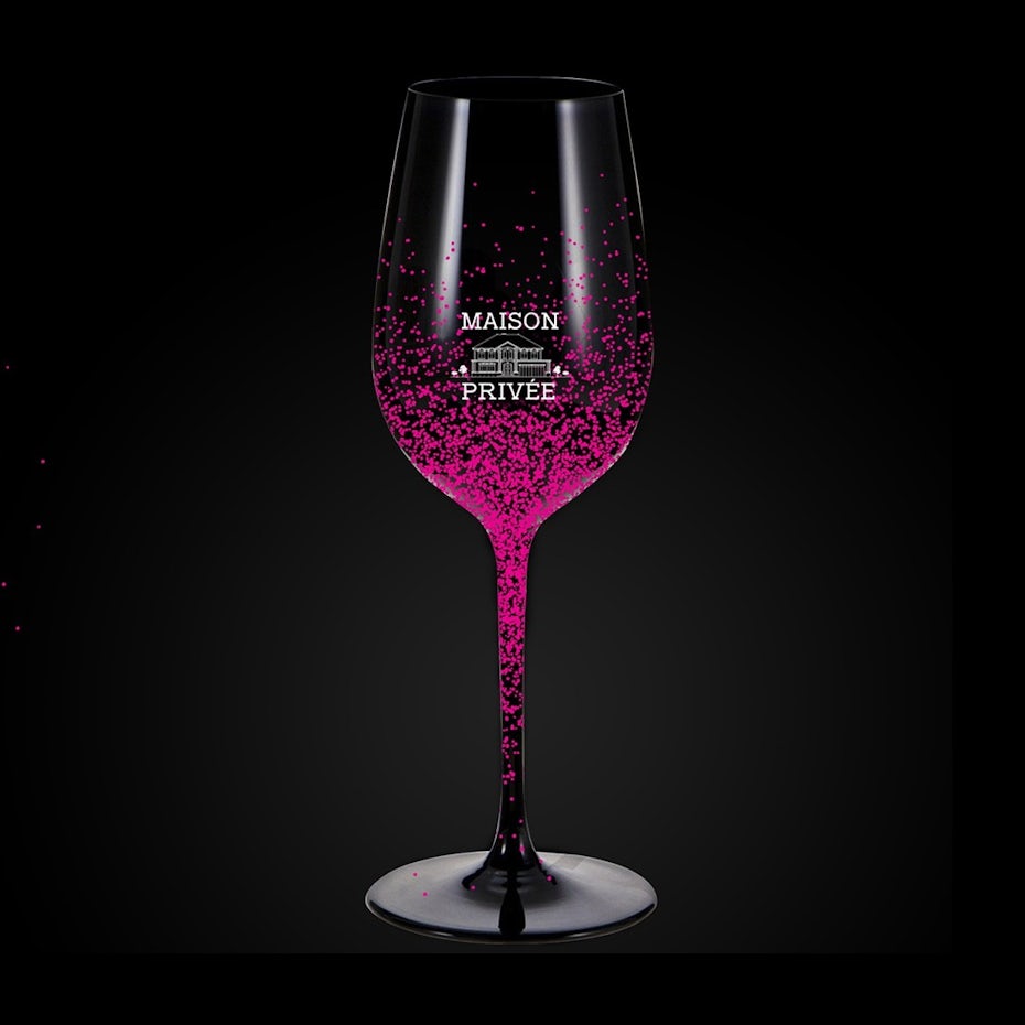 merchandise branding with wine glass design with pink flecks on it