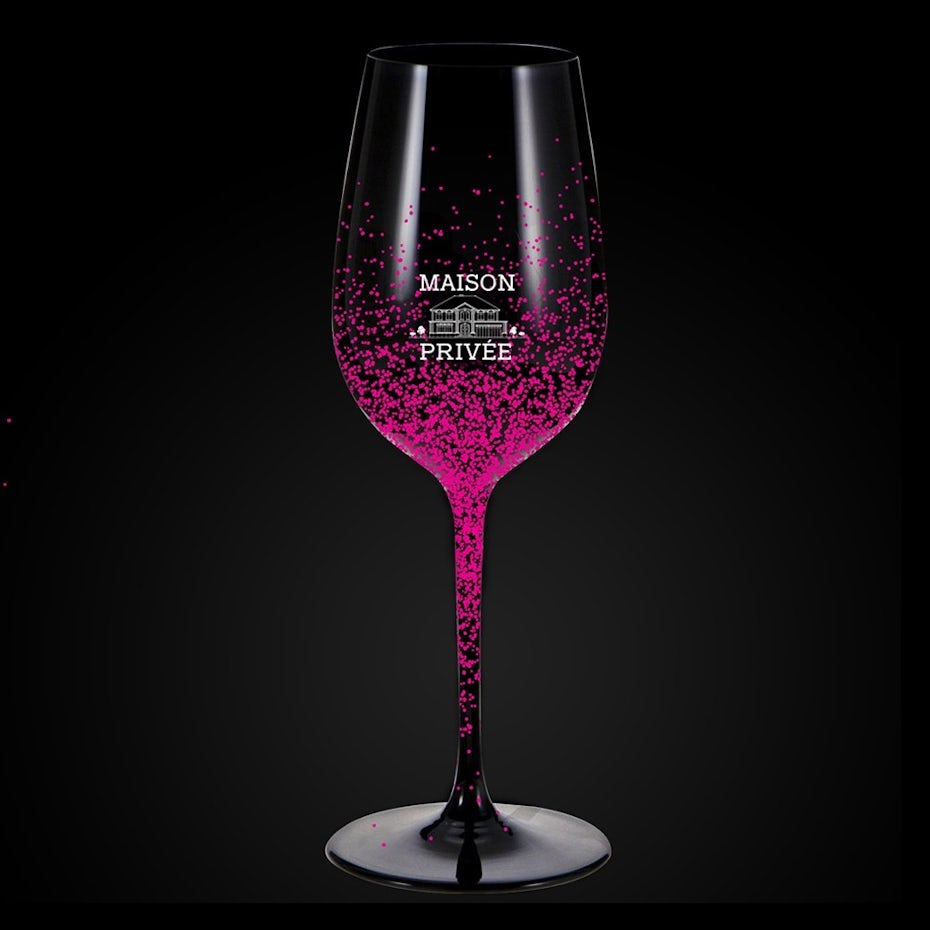merchandise branding with wine glass design with pink flecks on it