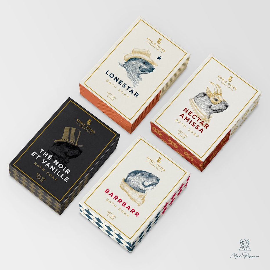 four pieces of soap packaging featuring otters