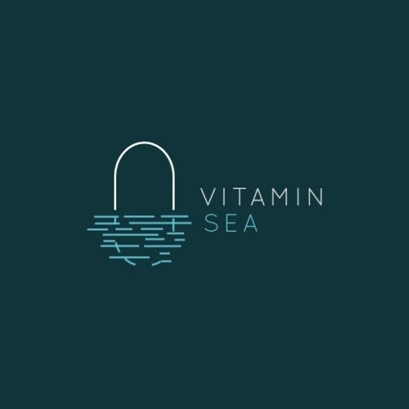 minimalist vitamin logo of a capsule in a body of water