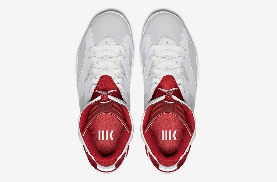 overhead photo of red and white sneakers
