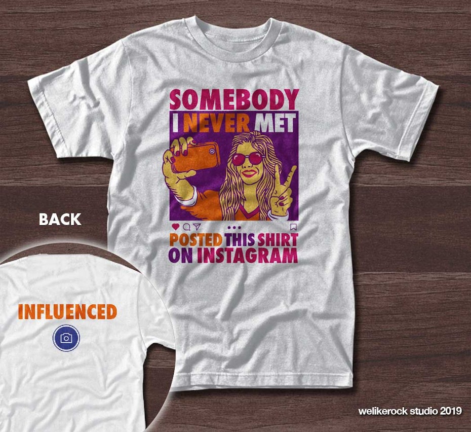 t-shirt with a colorful design of a woman taking a selfie