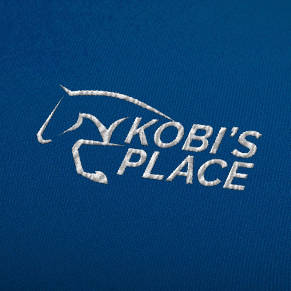 blue background with embroidered white logo of an abstract horse