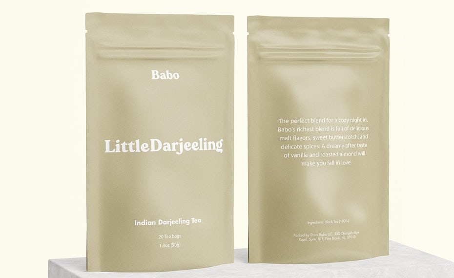 solid color packaging design trend: tan pouch packaging for a bubble tea kit