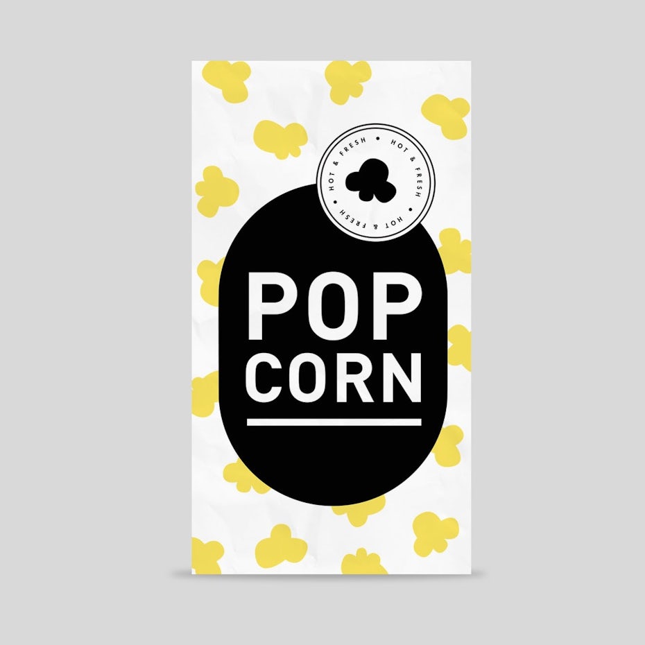 pattern packaging design trend: white popcorn box with a black text box and yellow popcorn pattern