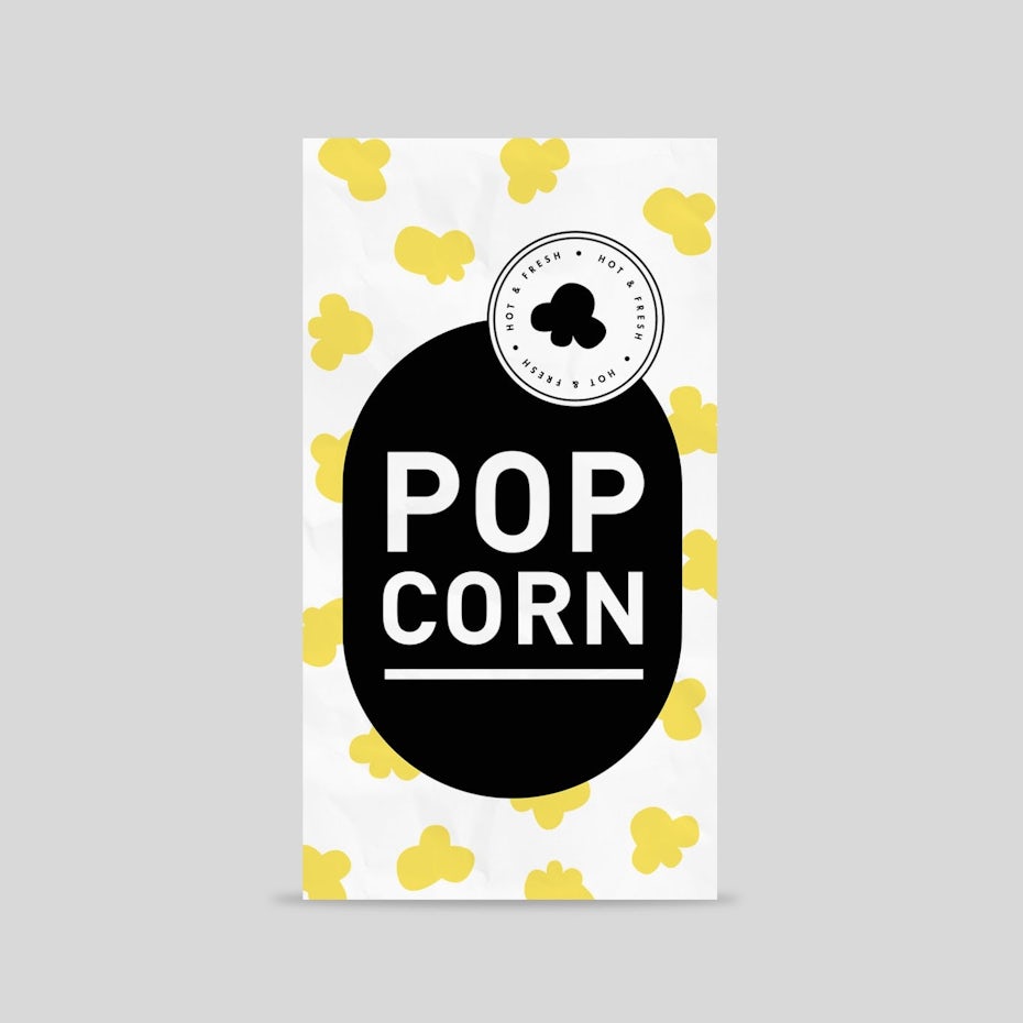 white popcorn box with a black text box and yellow popcorn pattern