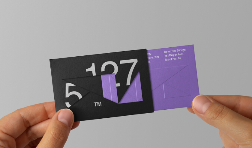 purple business card that slides into a black envelope