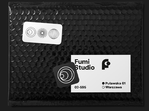 black and white business cards with simple geometric lettermark logo