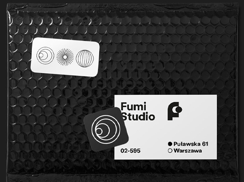 black and white business cards with simple geometric lettermark logo