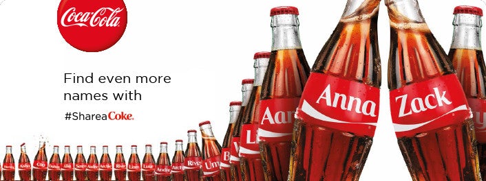 Share a Coke ad with Anna and Zach Coke bottles