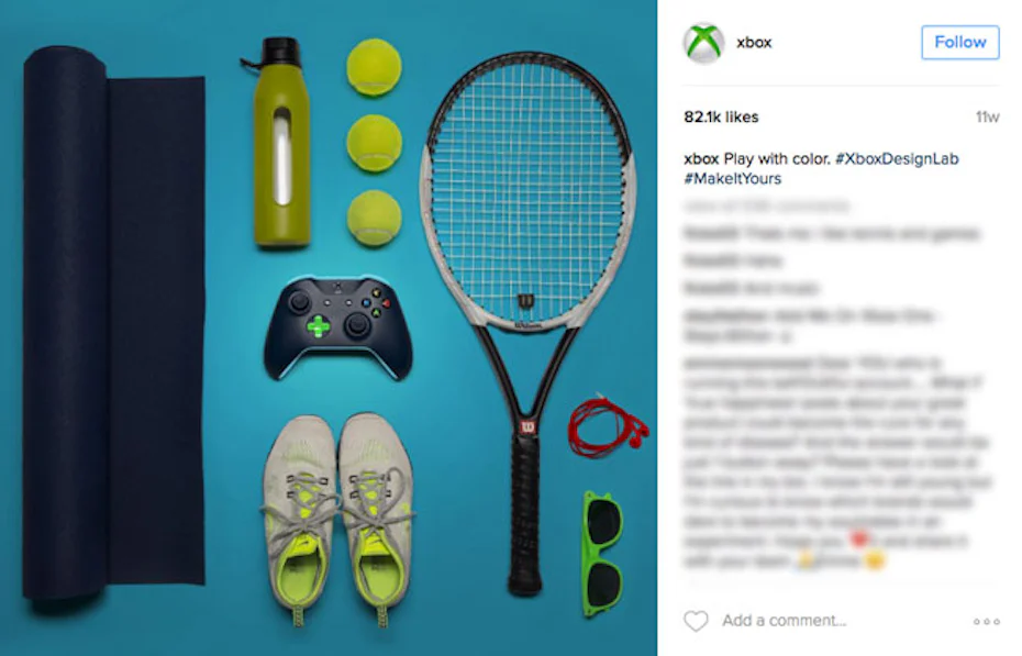 knolling image of an xbox controlled alongside athletic equipment