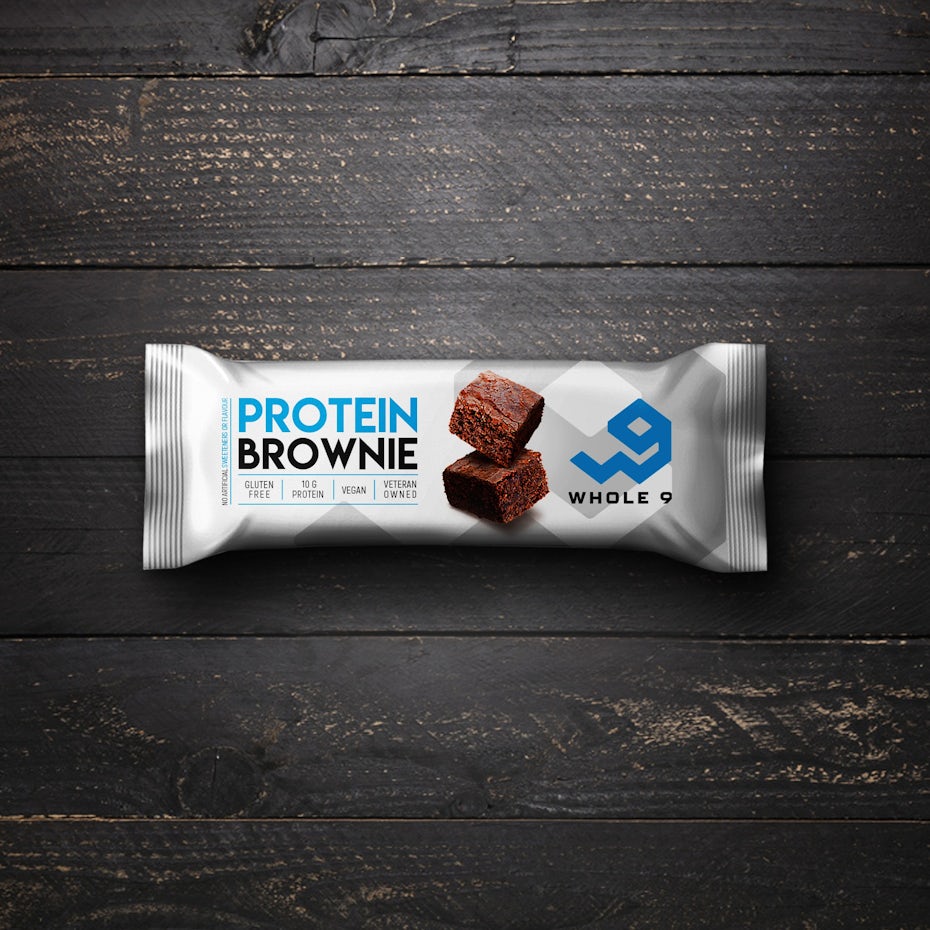 white packaging with blue and black text and a photo of a brownie