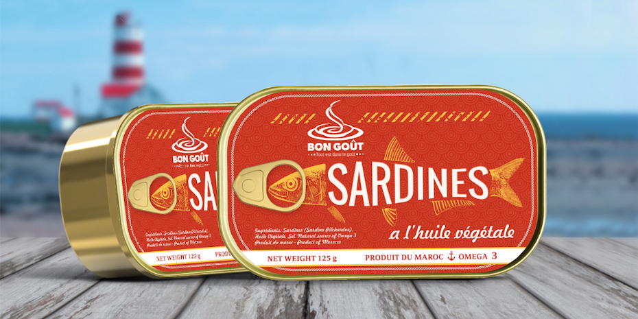gold sardine can with red label