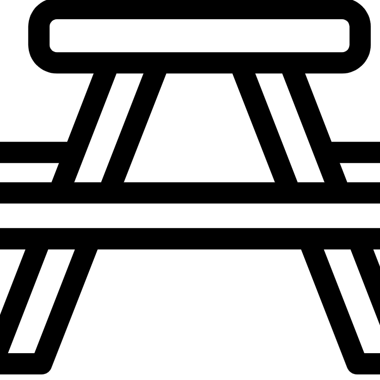 Black and white image showing a picnic table icon