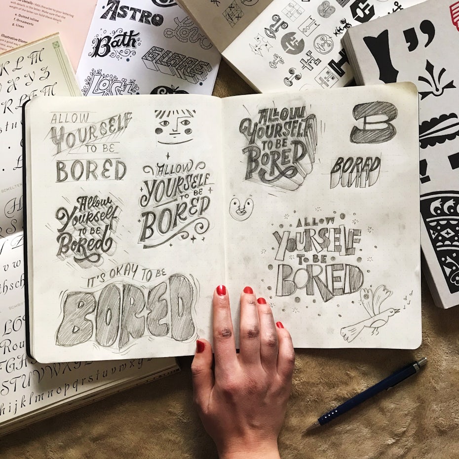 sketchbook page with logo sketching examples