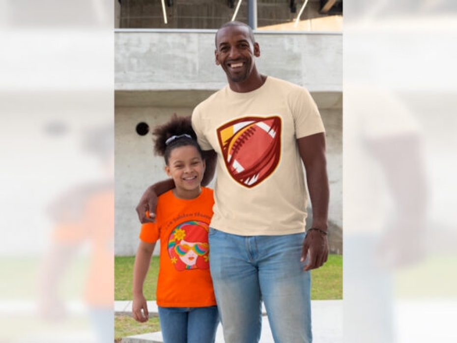 father and daughter standing beside each other