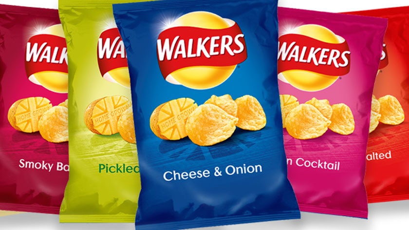 multiple flavors of Walkers crisps next to each other