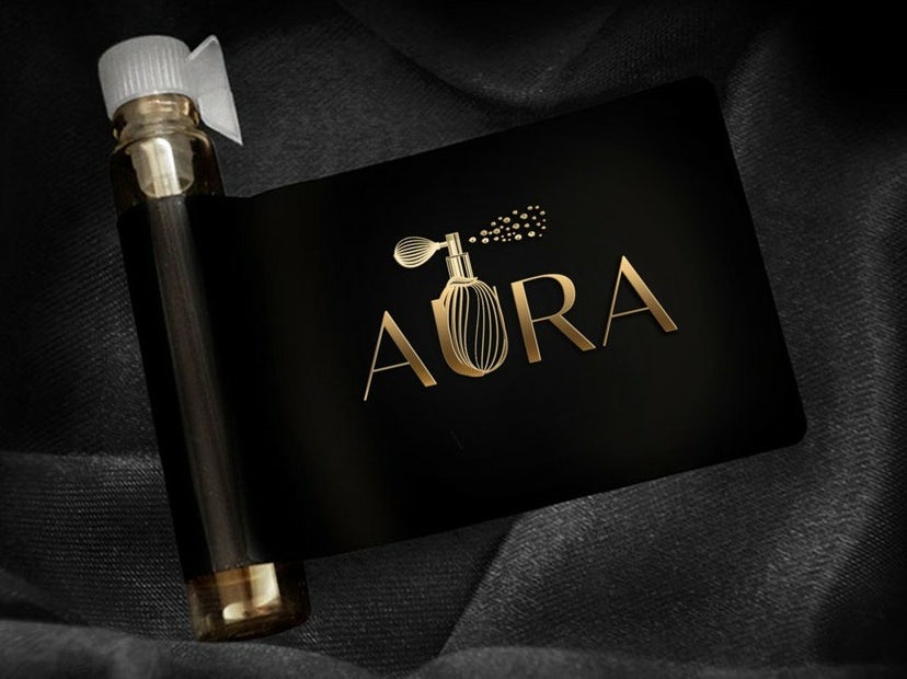 Perfume logo design with gold lettering