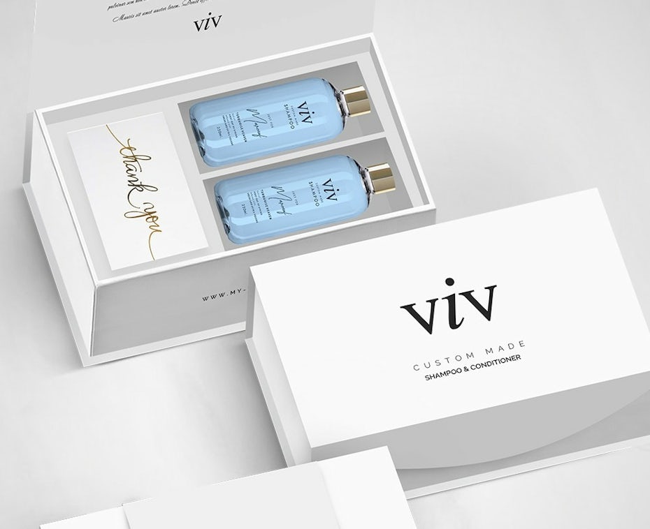 Blue and gold packaging design for a perfume brand