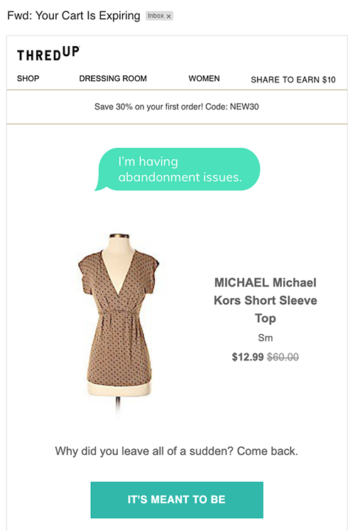 a low cut neckline brown dress with black polka dots
