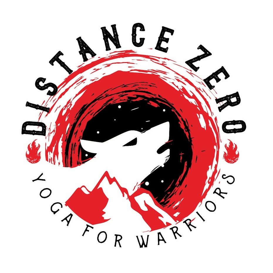 red and black logo showing a wolf’s head above a mountain