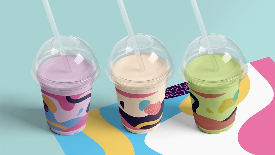 collection of plastic cups with slush drinks inside