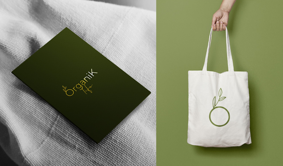 Una bolsa de lona blanca con un círculo verde unido a una ramita y hojas.