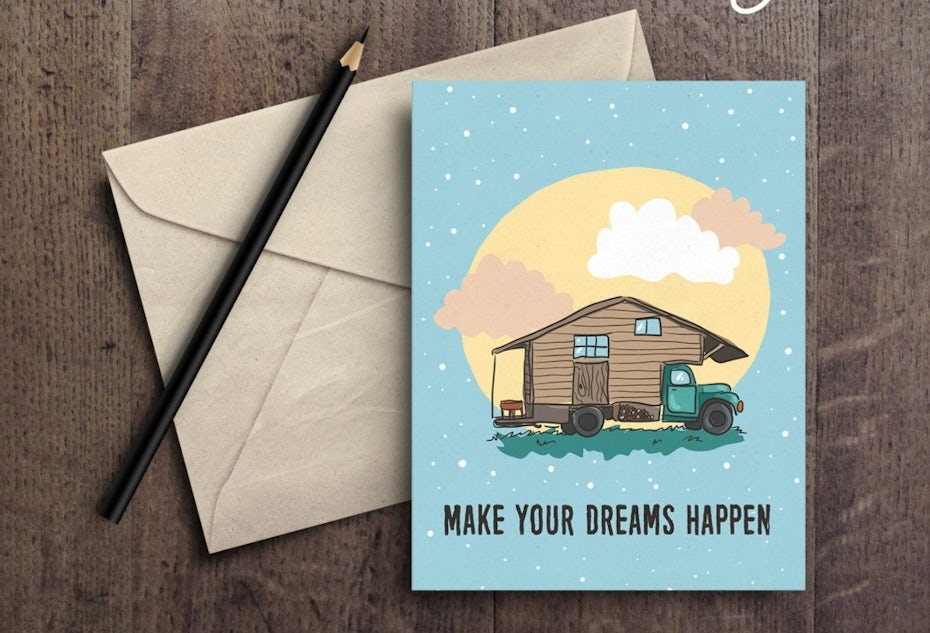 eine blaue Karte mit einem Wohnwagen und dem Text Mach deine Träume wahr