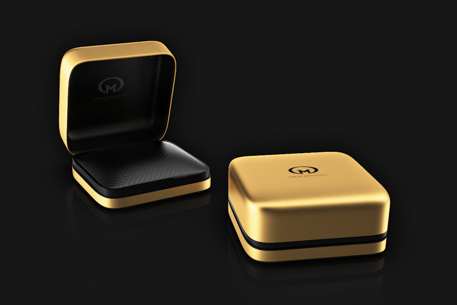 Gold ring box with black accents and outer cover