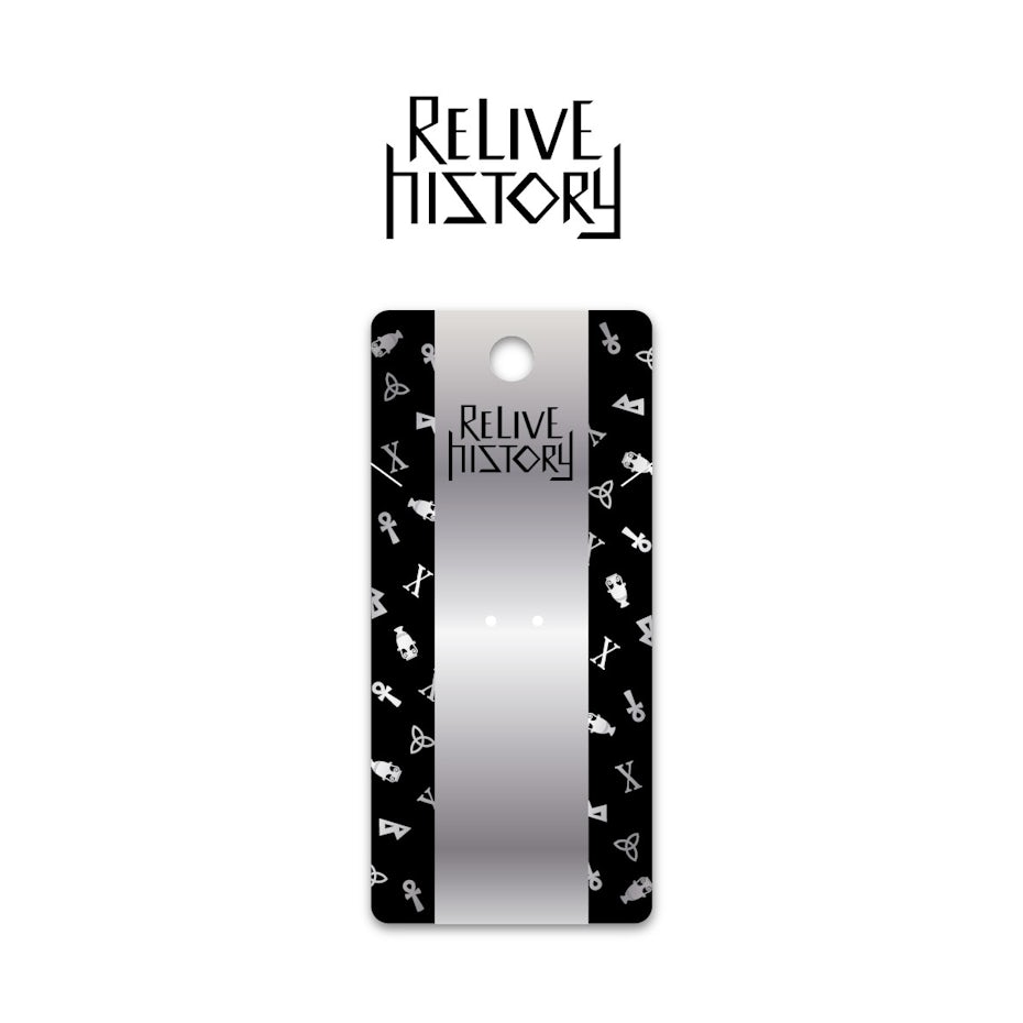 black and white earring holder with Ancient Egypt-inspired designs
