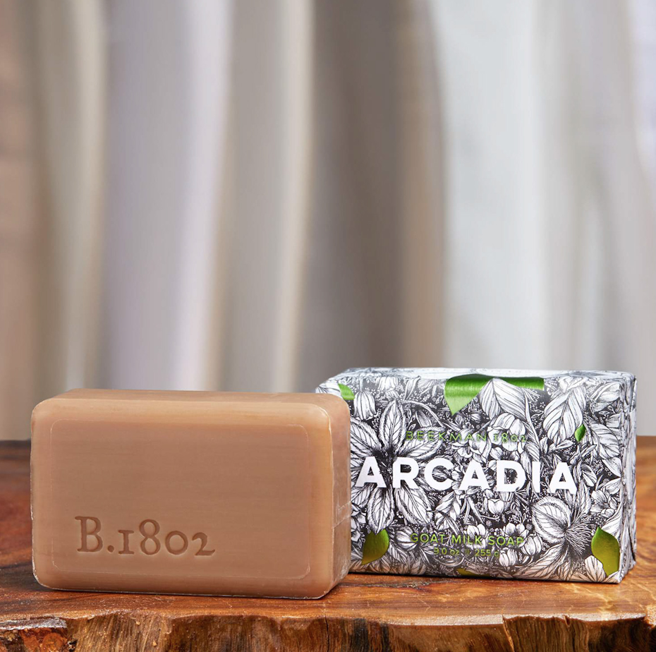 black and white soap packaging with pops of green