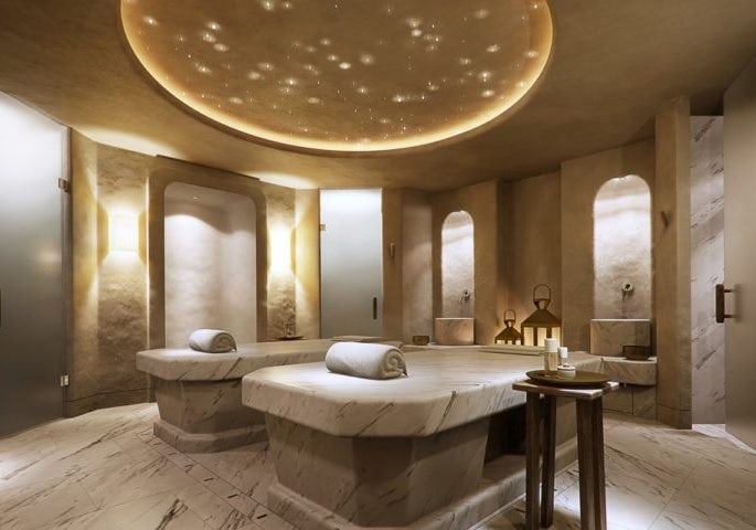 interior image of a massage room with neutral tones