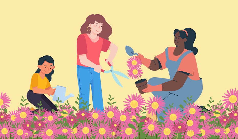 two girls and one woman gardening