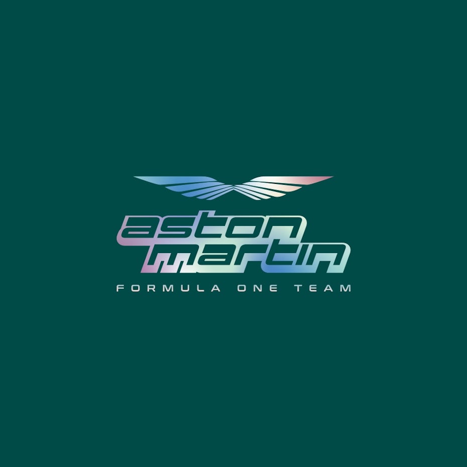 Aston Martin logo with wings in pink and blue iridescent colors on green background